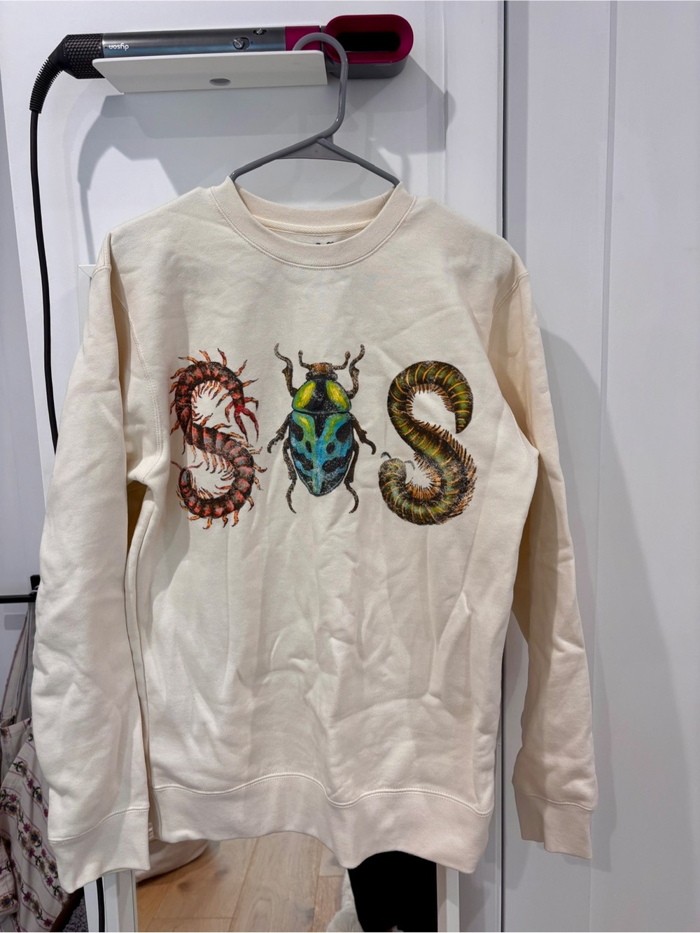SZA Official Grand National Tour SOS Cream Graphic Sweatshirt with Insect